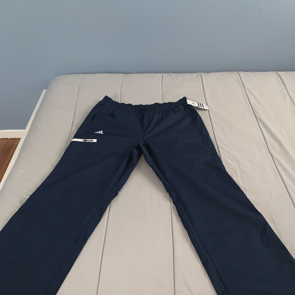 WOMENS ADIDAS CLIMAPROOF®️ Wind PANTS NAVY BLUE - Picture 4 of 8